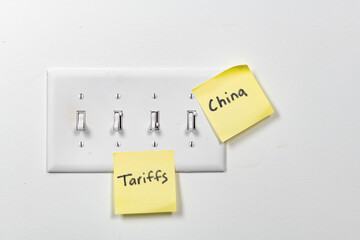 On off light switch with intensity sliders labeled with tariffs