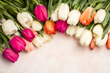Fototapeta premium Spring holiday postcard with colorful tulips and copy space, perfect for background