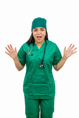 vertical Surprised latin surgeon wearing green uniform and stethoscope showing open hands