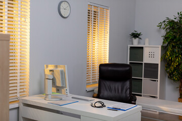 A modern office with natural light, designed for efficiency, comfort, and promoting productivity