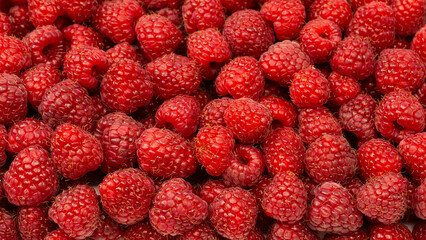 Tasty fresh raspberry as a background.