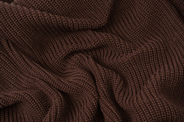 Brown sweater texture as a background.