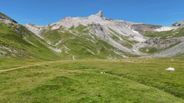 Flight towards mountain panorama with summit Tita Seri in Swiss Alps, Switzerland