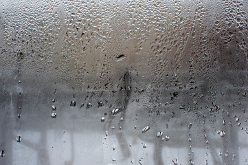 Wet raindrop background for window overlay, spring weather concept, background of rain water drops on transparent glass.