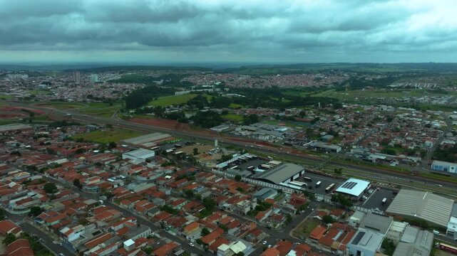 High-angle aerial view of highway infrastructure development. Construction of the access road to Shopping Botucatu, on the Teacher Joao Hipolito Martins Highway (SP-209). 01-16-2025