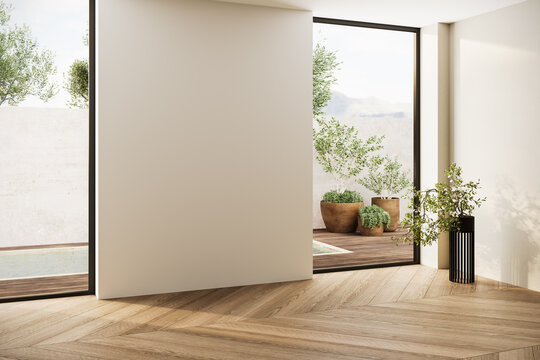 Fototapeta Empty minimalist room with natural light, wooden flooring, and a neutral wall, perfect for showcasing artwork or creative interior concepts. 3D render.