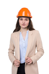 A girl architect in a suit and an orange construction helmet stands on a white background.