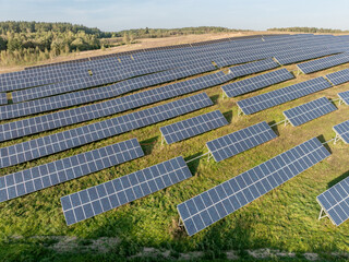 Rows of Photovoltaic Panels. Compose Renewable Energy. Drone Point of View. Solar Power Station...
