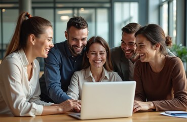 Diverse business team collaborates smiling over laptop in modern office. Happy colleagues brainstorm project, discuss ideas, teamwork, positive attitude, innovation. Group professionals, diverse