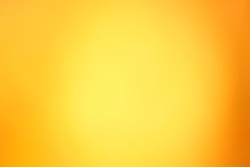 Gelbe sonnig freundliche Fläche mit heller Mitte und leuchtend kräftiger Farbe als Backdrop