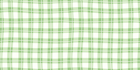 Seamless green plaid pattern with soft wavy lines and checkered grid layout. Classic textile style suitable for spring fabric, wrapping, clothing, wallpaper, or background design. Retro-inspired look.