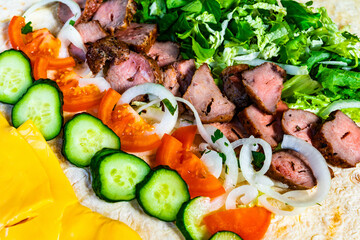 Delicious meat and vegetable preparation for a flavorful wrap