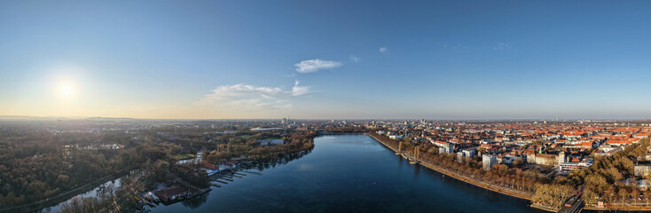 Experience a breathtaking aerial view showcasing a serene river alongside a stunning cityscape Hannover Maschsee Lower Saxony