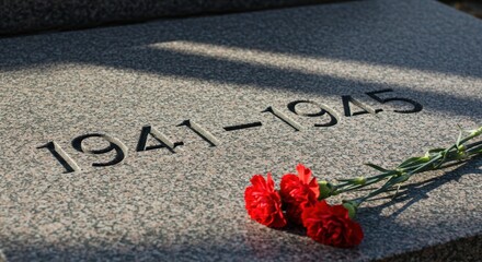 Memorial with Red Carnations for 1941-1945 Remembrance  