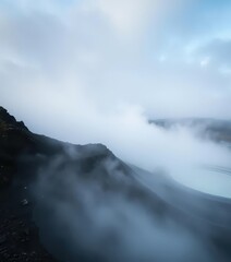 Obraz premium Ethereal mist shrouds geothermal vents in Haukadalur, Iceland, creating a cold, otherworldly landscape, autumn, Haukadalur, mist