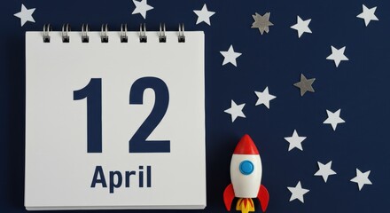 Calendar Page for April 12 with Rocket and Stars Background  