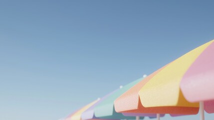 Colorful beach umbrellas under a clear sky