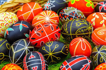 Traditional ornamets on Easter egg -Ukrainian pysanka.Mix of colored easter eggs with the traditional ukrainian slavic designs.Preparation for Christian holiday.