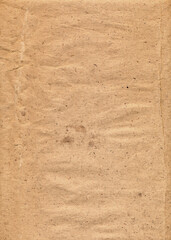 Vintage damage paper cardboard texture with small stains for the background. Template of background for the design of a poster, cover, illustration