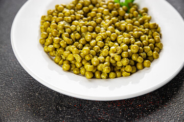 Green peas canned appetizer vegetables dish organic product fresh tasty gourmet food background on the table rustic food top view copy space keto and paleo diet vegetarian and vegan food
