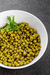 Green peas canned appetizer vegetables dish organic product fresh tasty gourmet food background on the table rustic food top view copy space keto and paleo diet vegetarian and vegan food