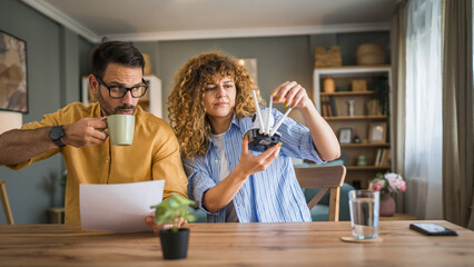 Couple at home connect and install cctv security surveillance camera