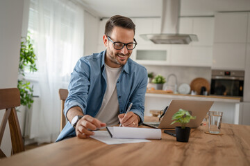 one man adult caucasian work on laptop at home happy smile