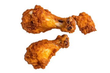 two pieces of crispy fried chicken drumsticks showcasing a golden-brown texture and a mouth-watering appearance ideal for food enthusiasts and culinary presentations
