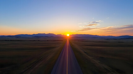 Aerial View Of Highway At Sunrise Over Plains