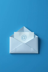 Minimalist composition of an envelope with an email symbol on a blue background, representing digital communication.