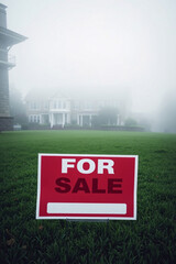 A charming house with a "Home Sale" sign in a lush, colorful garden, exuding warmth and appeal.