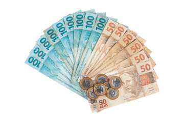 Brazilian real banknotes and coins fanned out including 100 and 50 reais bills