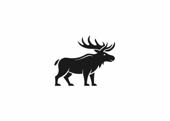 Majestic Moose Silhouette: A striking silhouette of a moose stands confidently, its impressive antlers on full display, embodying strength and wilderness.