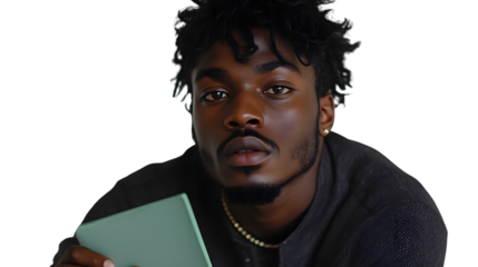 A man with a beard and earring holding a tablet showcasing technology and style in a modern se