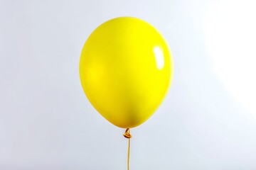 Sunny yellow balloon on clean white base  
