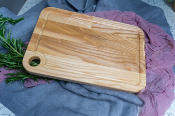 wooden cutting board with a knife