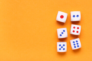 White game dices on orange background