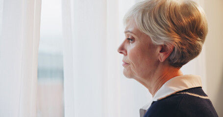 Depression, memory loss and senior woman thinking at house window with Alzheimer, dementia or grief. Lonely, anxiety and sad elderly person in retirement home with stress, regret and doubt crisis