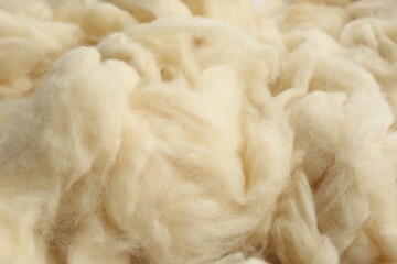 Soft white wool texture as background, closeup