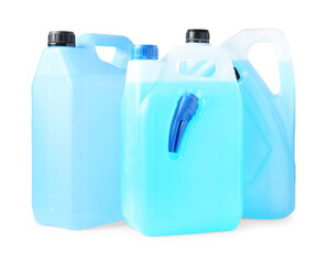 Antifreeze in plastic canisters isolated on white
