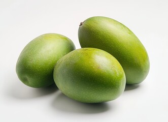 Obraz premium Fresh Green Mangoes on White Background, Ready for Fruit Salad, Smooth Skin, Healthy Snack Option, Nature's Sweetness, Tropical Flavor Profile, Unripe Fruit