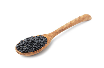 Raw lentils in wooden spoon isolated on white