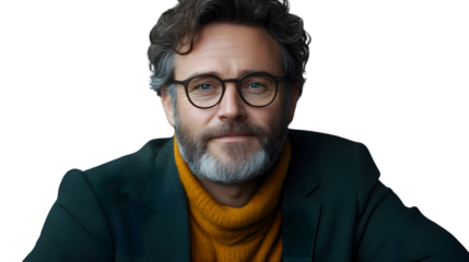 Portrait of a man with glasses and beard wearing a teal jacket and mustard sweater