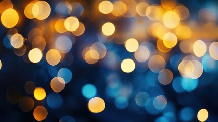 Fototapeta premium Abstract golden bokeh lights on a dark blue background, creating a glowing effect. Ideal for Christmas or New Year's themes, featuring defocused light particles.