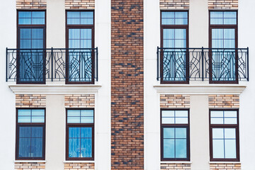 Penthouse apartment balconies and windows.