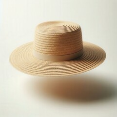 Minimal floating straw hat on clean white background. High-resolution, isolated object perfect for fashion mockups, summer themes, and design overlays.