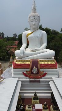 Aerial view of the White Buddha statue, a religious tourist attraction in Singburi, Thailand