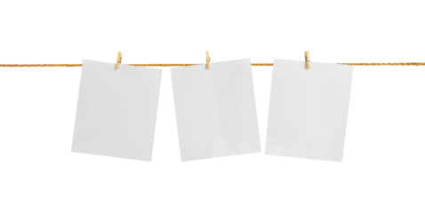 Blank paper hanging on a rope with an isolated clothespin on a white background