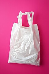 White Plastic Shopping Bag on Pink Background Minimalist Product Photography