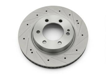 Close up of a gray brake rotor with holes and lines on a white background in studio lighting